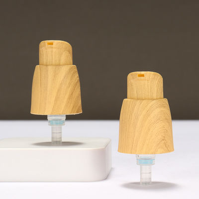 Pompa di lozione di plastica a 0,25cc senza aria pompa di lozione per mani con grano di legno